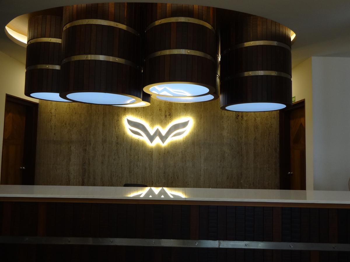 Woodies Bleisure Hotel Kozhikode Bagian luar foto