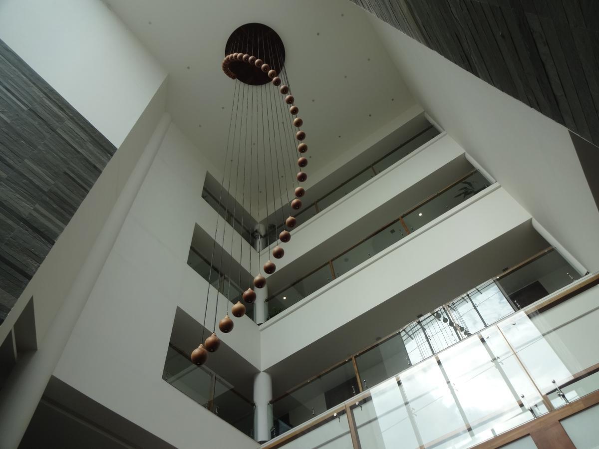 Woodies Bleisure Hotel Kozhikode Bagian luar foto